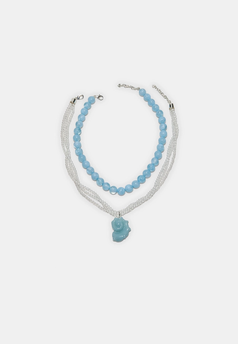 Набор из 2 ожерелий с бусинами и ракушками