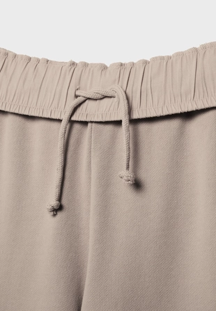 Брюки-джоггеры прямого кроя с эффектом потертости- Заказать в России