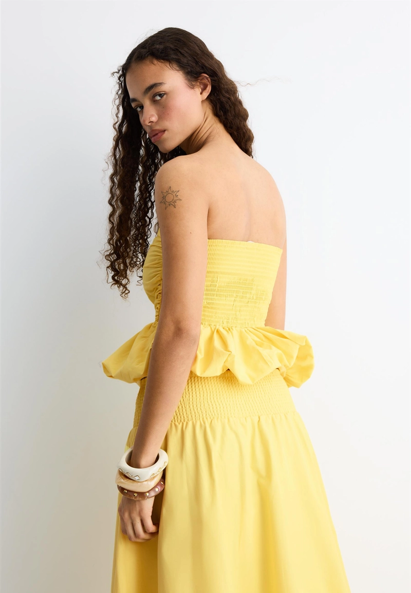 Топ-бюстье с объемным низом