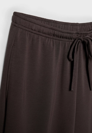 Мягкие брюки-джоггеры фасона баллон- Заказать в России