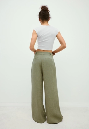 Широкие брюки рустик с регулируемыми пуговицами- Заказать в России