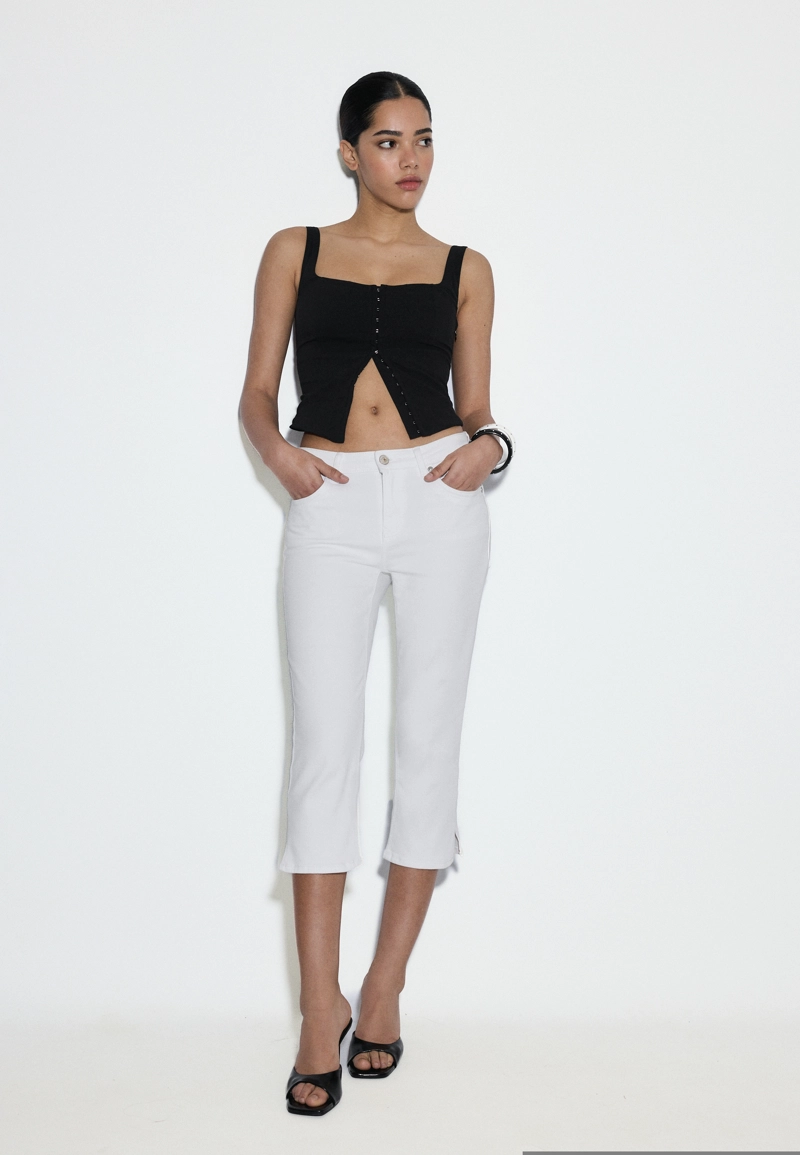 Джинсы капри