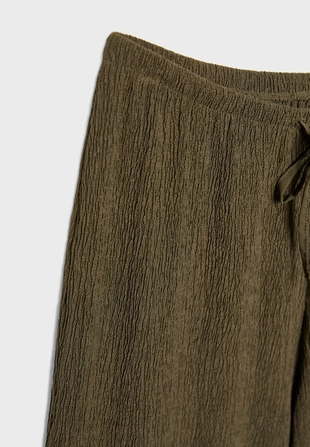 Брюки прямого кроя с эффектом помятости- Заказать в России