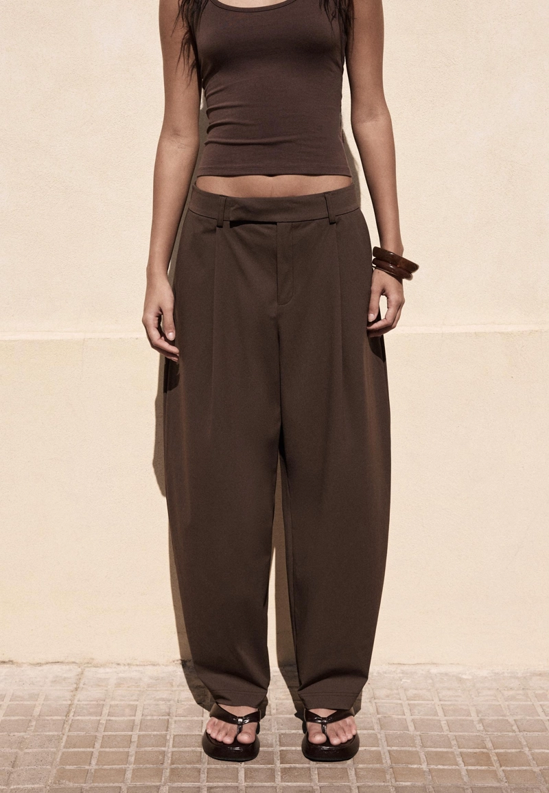 Брюки с защипами