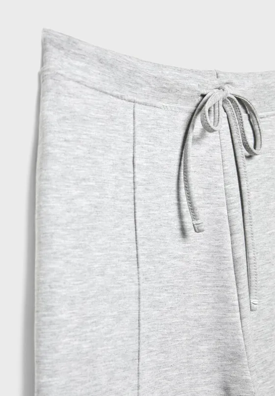 Мягкие джоггеры свободного кроя с отстрочкой