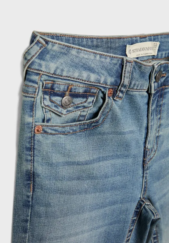 D04 Джинсы клеш с низкой посадкой