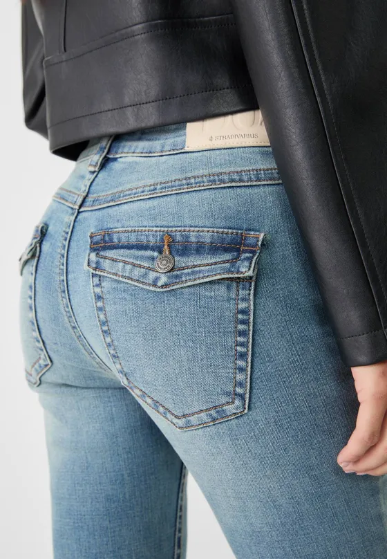 D04 Джинсы клеш с низкой посадкой