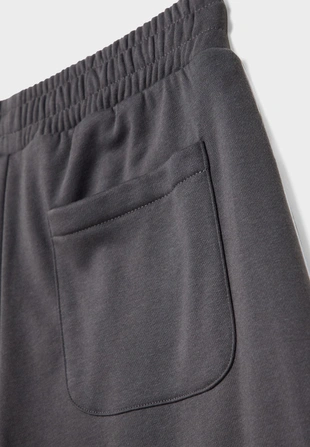 Брюки из мягкой ткани с широкими штанинами и окантовкой- Заказать в России