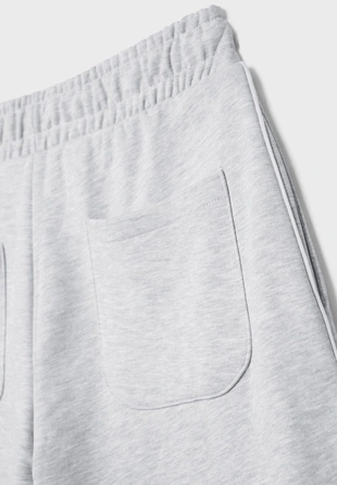 Брюки из мягкой ткани с широкими штанинами и окантовкой- Заказать в России