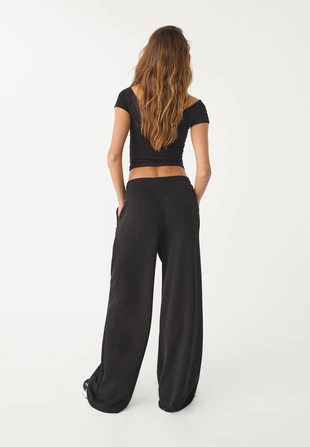 Брюки-джоггеры палаццо, мягкие на ощупь- Заказать в России