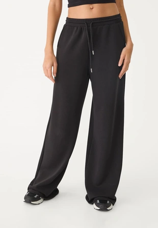 Брюки-джоггеры палаццо, мягкие на ощупь- Заказать в России