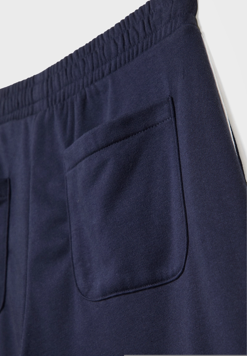 Брюки из футера свободного кроя с кантом